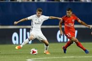 COLUMBUS, OH - JULY 27:  Aleix Febas #36 of Real Madrid C.F. and Hatem Ben Arfa #21 of Paris Saint-Germain F.C battle for control of the ball during the second half on July 27, 2016 at Ohio Stadium in Columbus, Ohio. Paris Saint-Germain F.C. defeated Real Madrid C.F. 3-1. (Photo by Kirk Irwin/Getty Images)